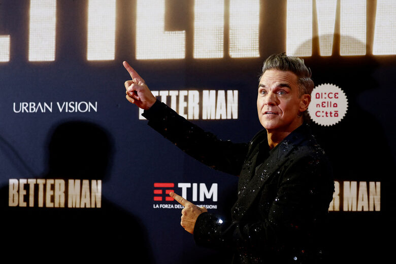 Роби Уилямс на представянето на филма си Better Man
