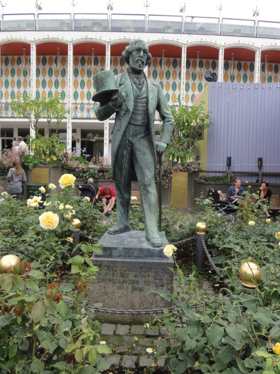 Йохан Бернхард Георг Карстенсен (1812-1857) - един от предприемачите, участвали в създаването на "Тиволи". През 1843 г. Копенхаген получава собствена "градина за удоволствия", когато той (талантлив и предприемчив мъж, пътувал много по света) получава одобрение от краля да открие своя парк "Тиволи" в покрайнините на града. (През ХVІІІ и ХІХ век "градини на удоволствието", наричани обикновено "Тиволи" или Воксхол") се появяват по цяла Европа като форма на бягство от все по-разширяващите се градове. Обикновено градините са били основавани като красиви и лирични паркове, допълнени с алеи, павилиони, музикални изпълнения, обществени места и забавления.)
