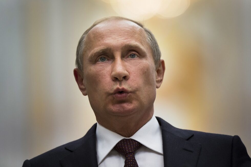 Руският президент Владимир Путин по време на пресконференция след срещата си с украинския президент Петро Порошенко в Минск.