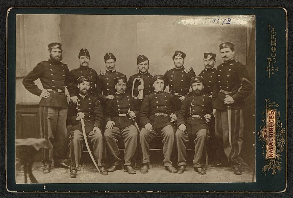 Анастас открива фотографията в Белград, снима някои от най-значимите български революционери, измежду които са Васил Левски, Ангел Кънчев, Любен Каравелов, Стефан Караджа, Панайот Хитов, Ильо Войвода. Седалището на комитета на Каравелов дори се мести в дома на Карастоянов. Дейността му с хайдутите бележи началото на репортажната фотография в Сърбия.<br /><br />На снимката: Участници във Втората българска легия в Белград заснети от Анастас Карастоянов през 1867 година. Третият от ляво надясно е Васил Левски. Стъкленият негатив на тази, както и на много от фотографиите на българските възрожденци, е бил пренесен в Княжество България и многократно размножаван на картони /картички/ с имената на двамата потомци на Анастас Иван и Димитър Карастоянови.