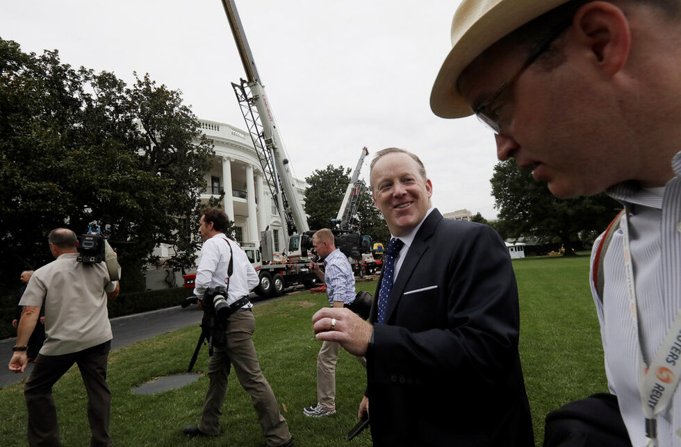 Former White House Press Secretary and Communications Director Sean Spicer (2nd R) talks with Reuters correspondent and former White House Correspondents Association President Jeff Mason (R) during a press tour in the midst of renovations at the White House in Washington, U.S.