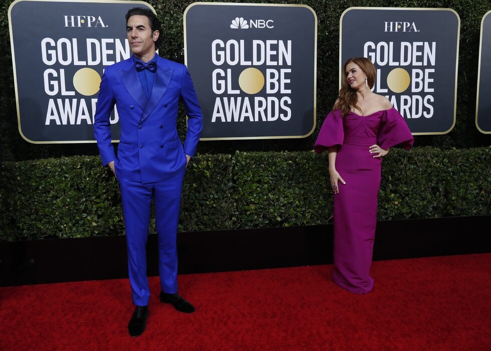 Саша Барън Коен и Айла Фишър.